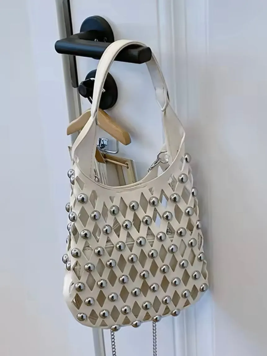Solid colors studded net cutout handbag