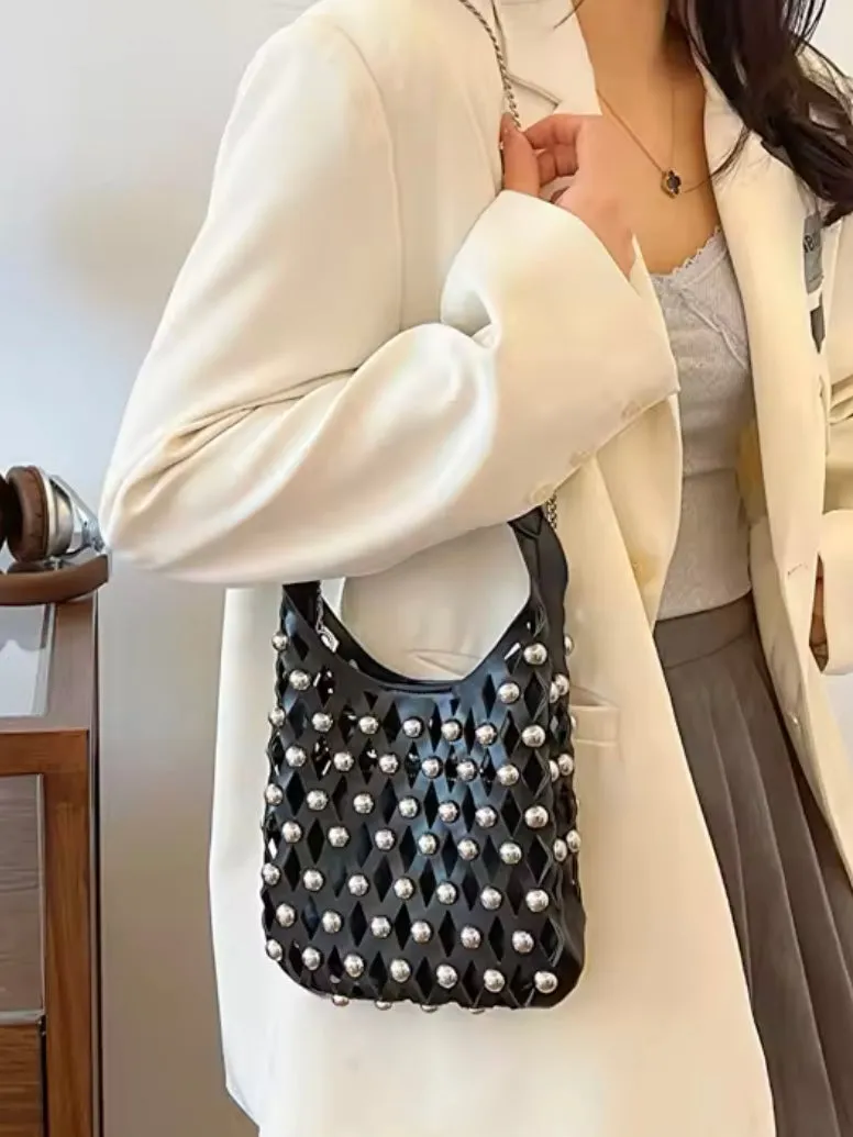 Solid colors studded net cutout handbag