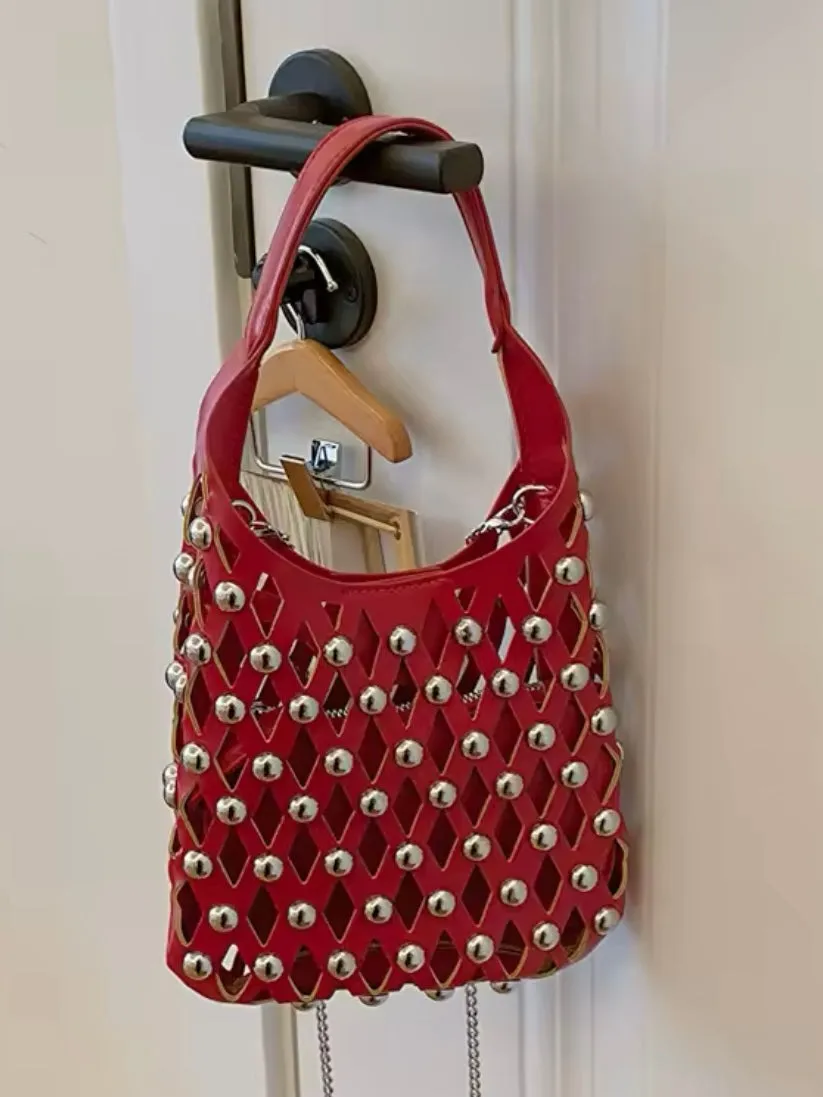 Solid colors studded net cutout handbag